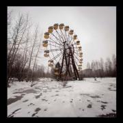 Picture of an abandoned carousel in the city of Prypiat, 2011.